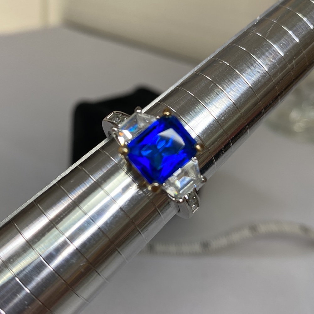 Gorgeous simulated sapphire and CZ ring